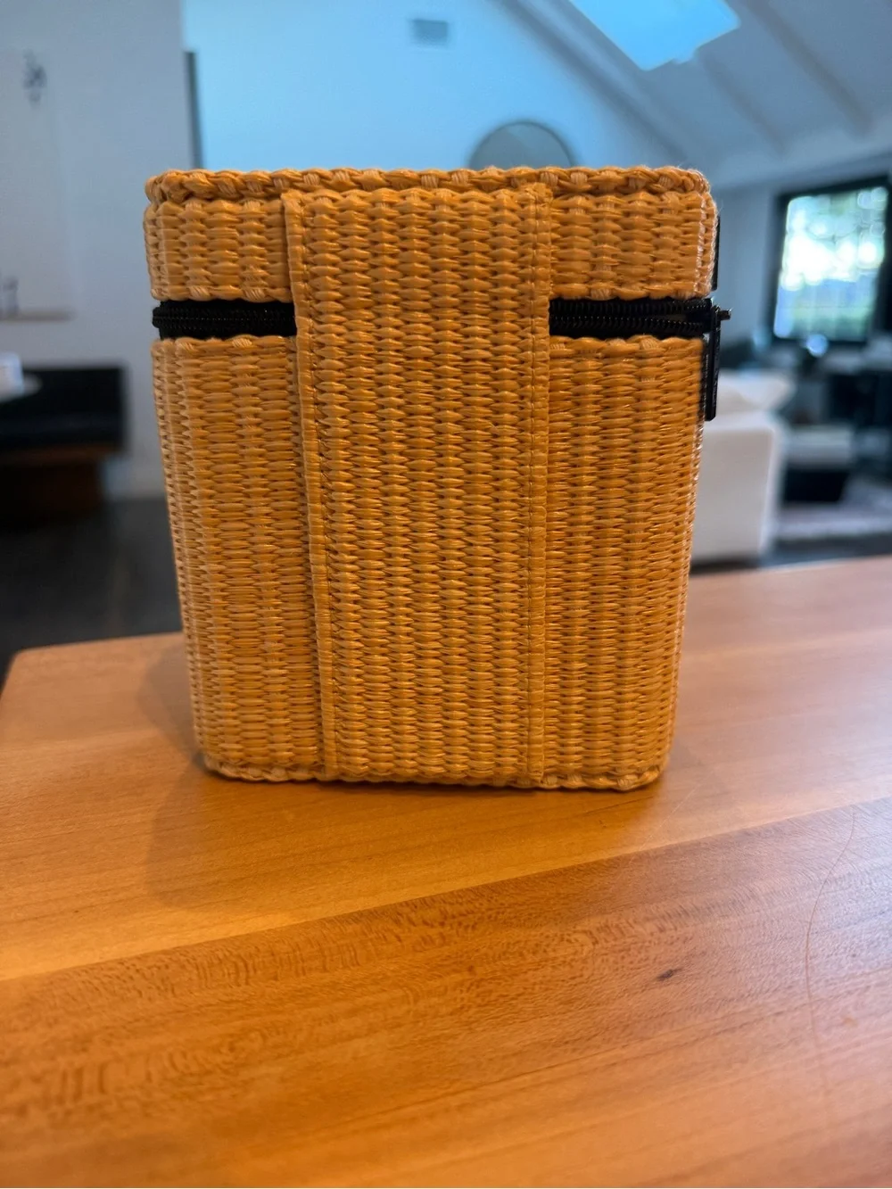 CHANEL Straw Cosmetic Case in Natural and Black with products